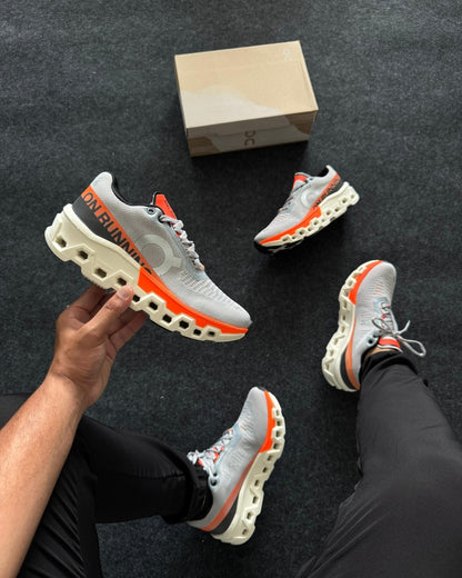 Tênis Masculino On Cloudmonster 2 Cinza e Laranja
