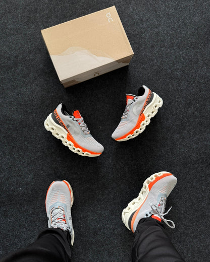 Tênis Masculino On Cloudmonster 2 Cinza e Laranja