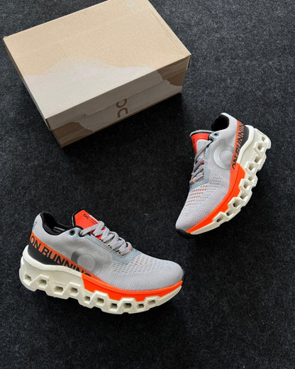 Tênis Masculino On Cloudmonster 2 Cinza e Laranja